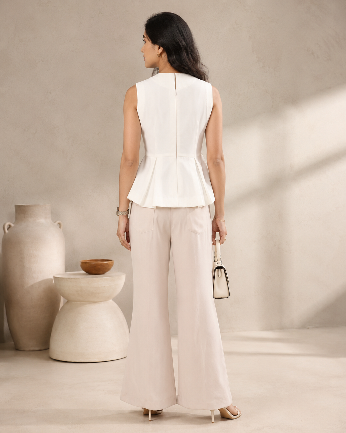 Ivory Sleeveless Peplum Top