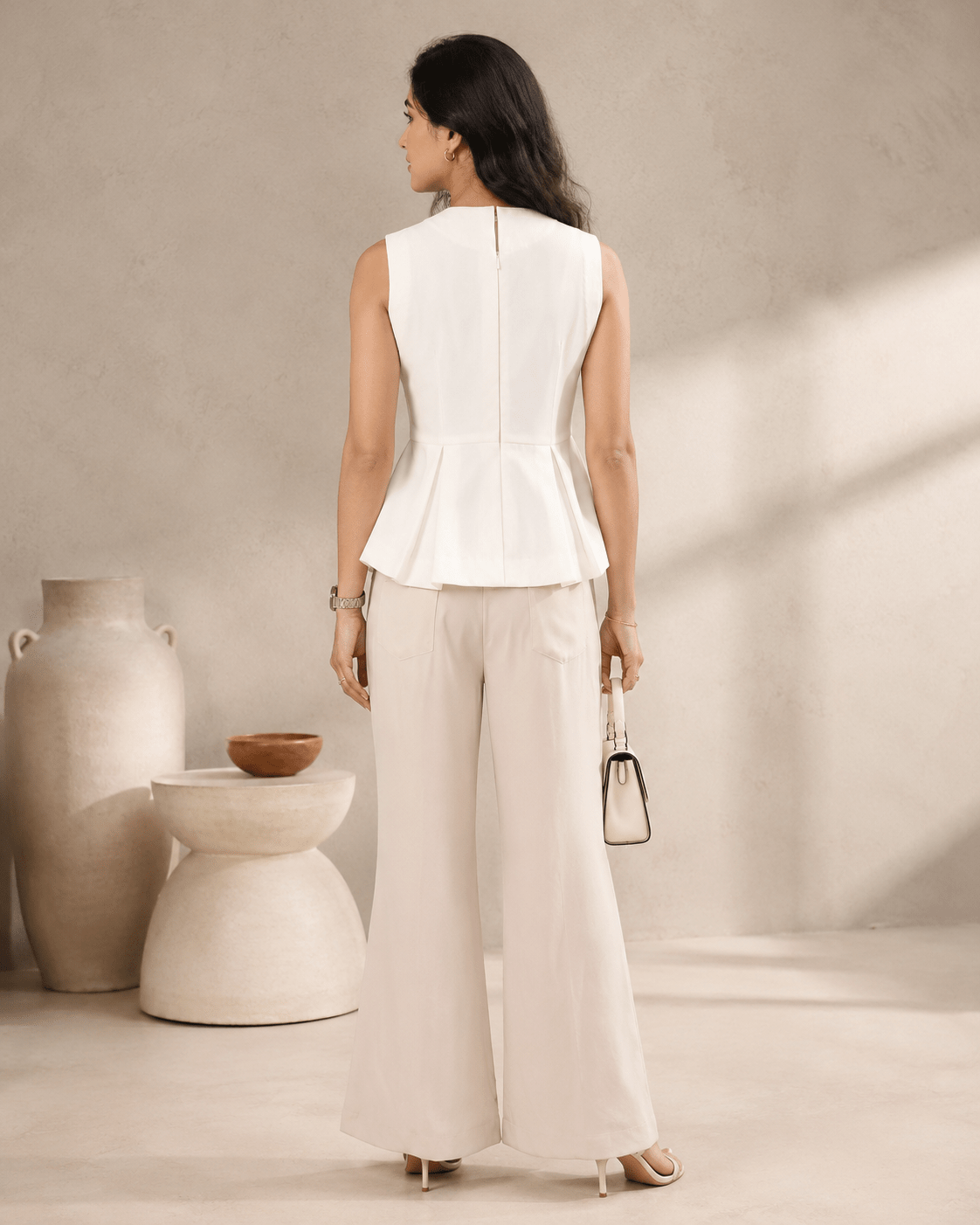 Ivory Sleeveless Peplum Top - Mileenia